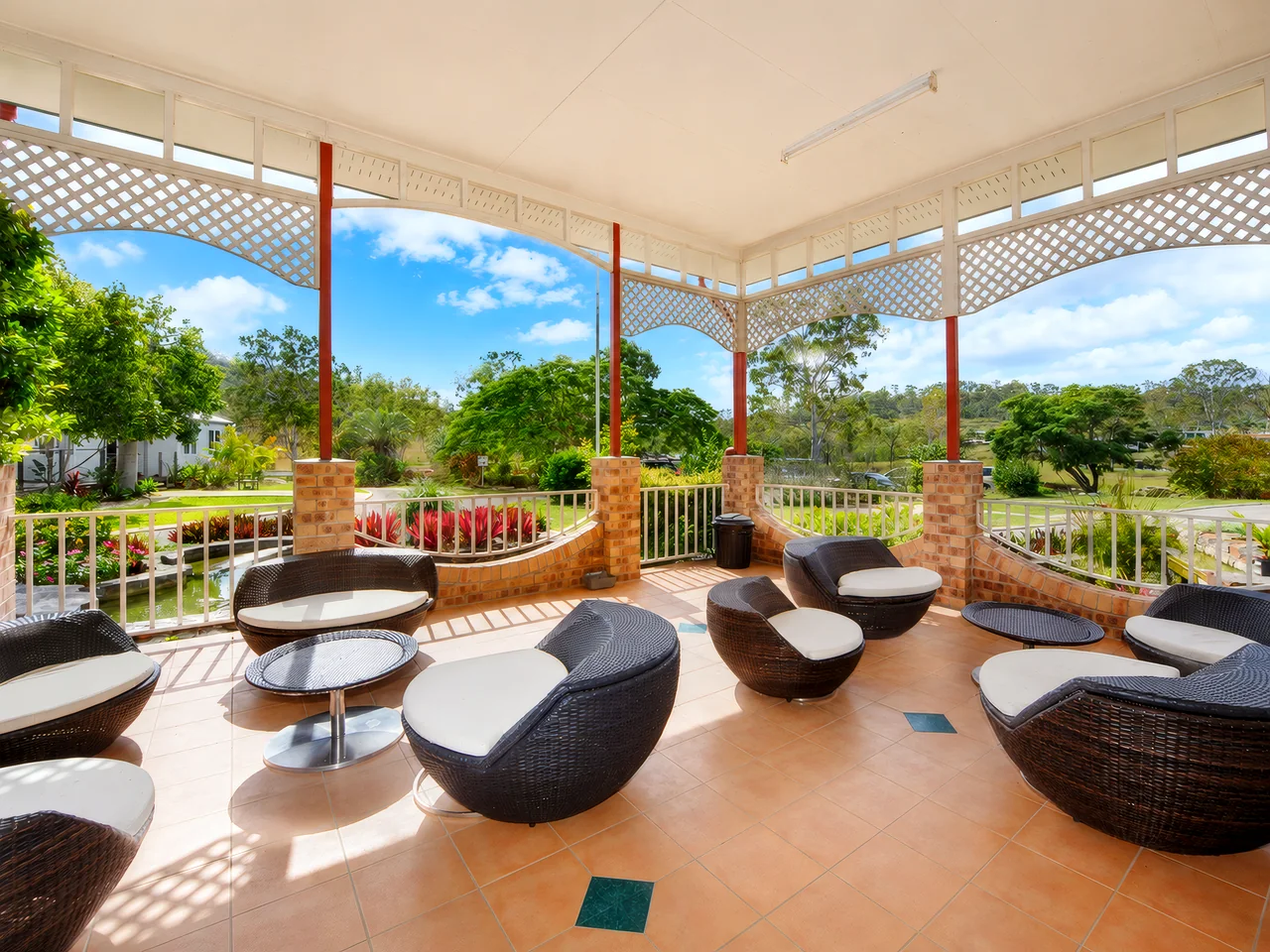 the covered verandah overlooking the gardens