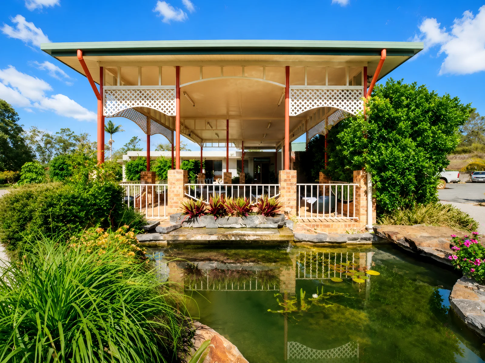 the garden pond and verandah at Parklands
