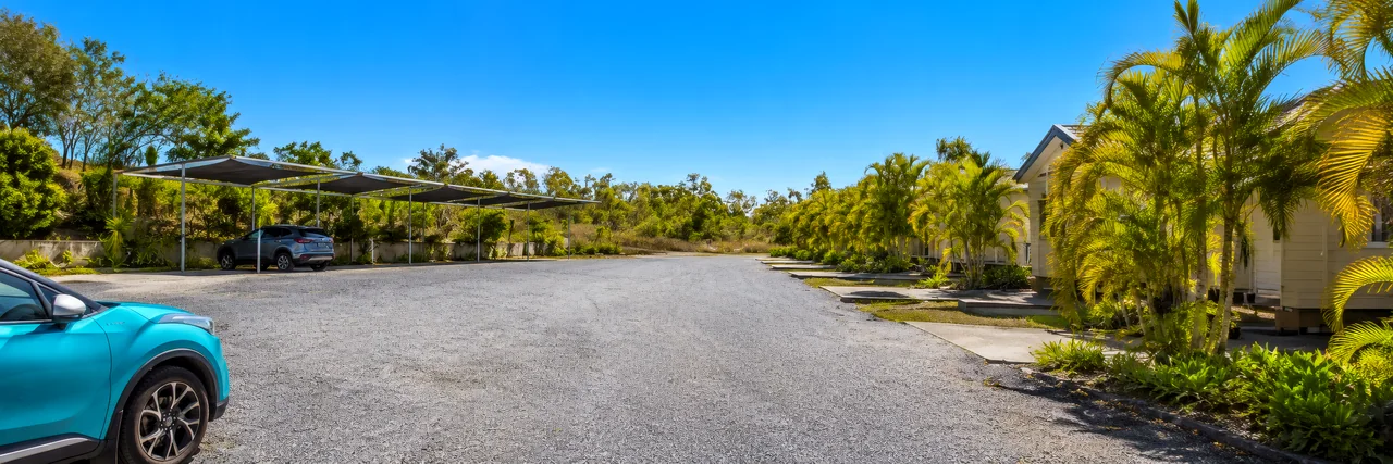 the grounds and shaded parking at Parklands Resort